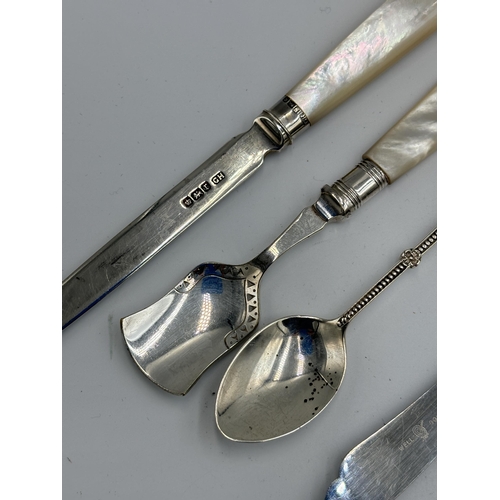 2156 - Eight items to include , Birmingham silver teaspoon, Sheffield silver paper knife with mother of pea... 