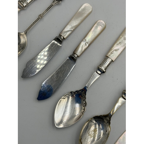 2156 - Eight items to include , Birmingham silver teaspoon, Sheffield silver paper knife with mother of pea... 