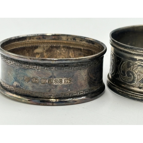 2166 - Three hallmarked sterling silver napkin rings, one Chester and two London - approx. gross weight 30g