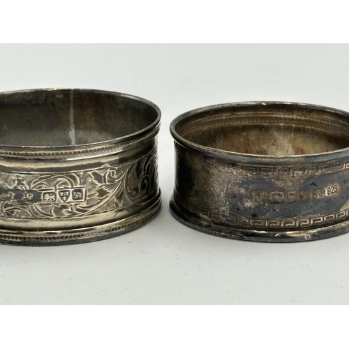 2166 - Three hallmarked sterling silver napkin rings, one Chester and two London - approx. gross weight 30g