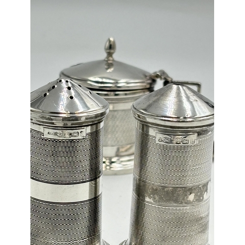 2168 - Two George V Joseph Gloster Ltd. hallmarked Birmingham silver three piece cruet sets, dated 1935 - a... 