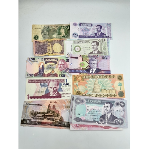 2220 - A collection of world banknotes to include Central Bank of Iraq, six 1978 North Korea one-hundred wo... 