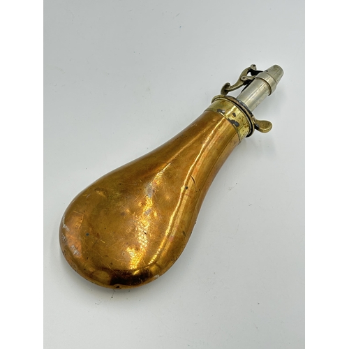 2254 - A 19th century Colt Walker type copper powder flask - approx. 21.5cm long