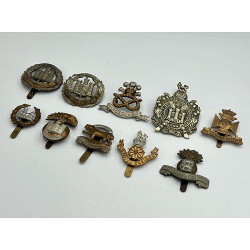 2263 - Ten military cap badges