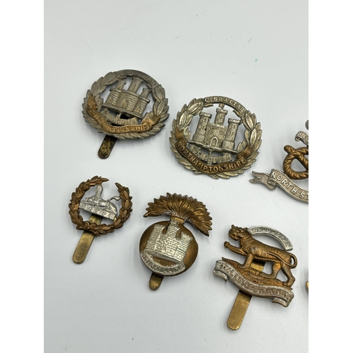 2263 - Ten military cap badges