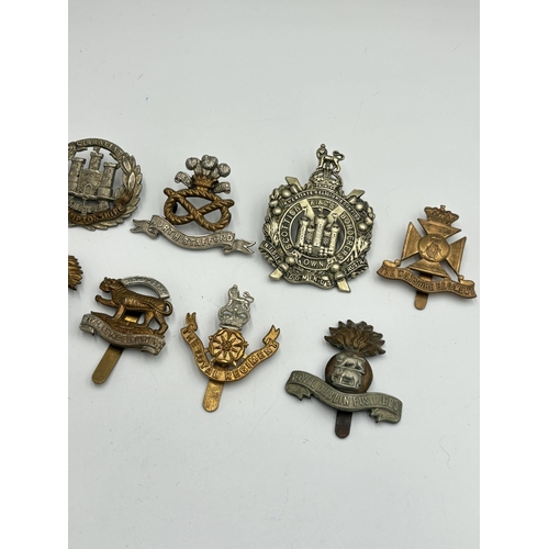 2263 - Ten military cap badges