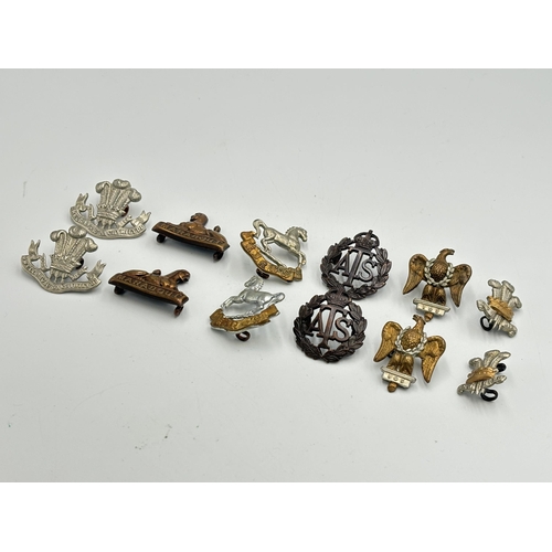 2264 - Ten military cap and collar badges