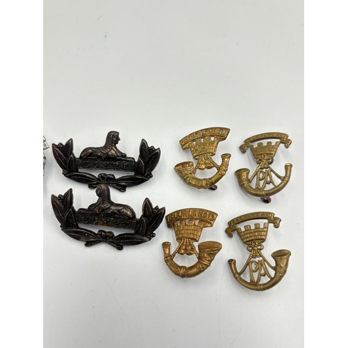 2281 - Ten military cap and collar badges