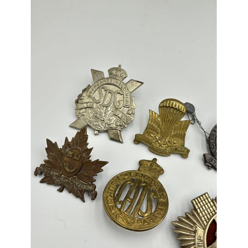 2289 - Ten military cap badges to include Canadian Garrison Battalion, Canadian Parachute Corps etc.