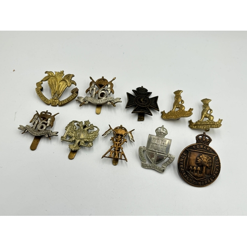 2293 - Ten military cap badges