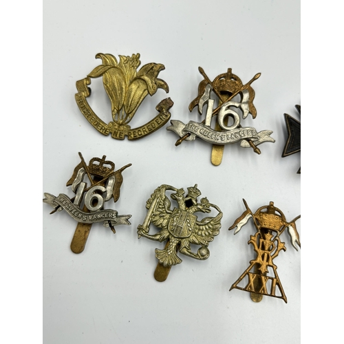 2293 - Ten military cap badges