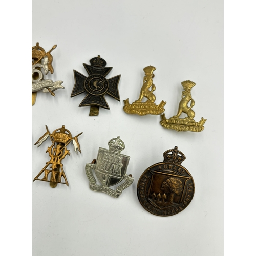 2293 - Ten military cap badges