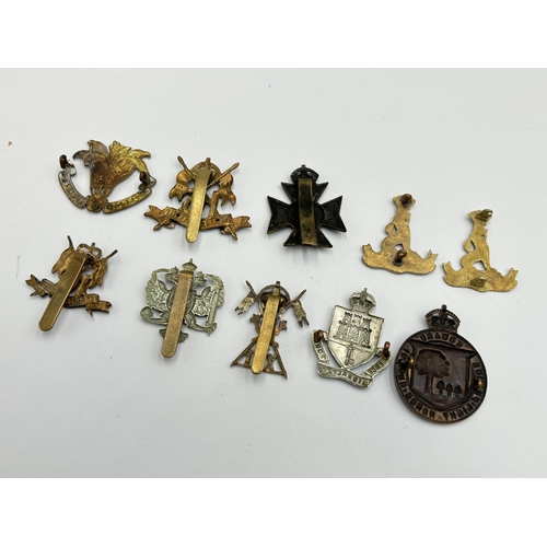 2293 - Ten military cap badges