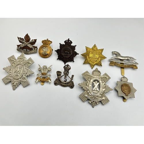 2294 - Ten military cap badges