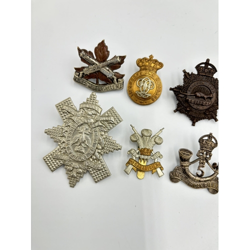 2294 - Ten military cap badges