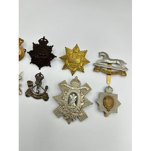 2294 - Ten military cap badges