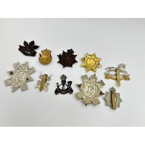 2294 - Ten military cap badges