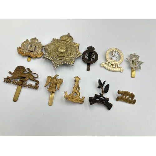 2295 - Ten military cap badges