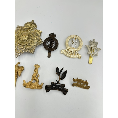 2295 - Ten military cap badges