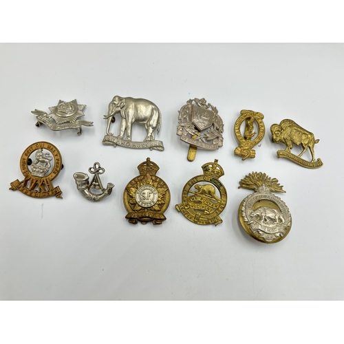 2296 - Ten military cap badges