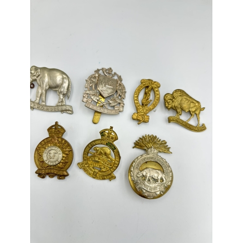 2296 - Ten military cap badges