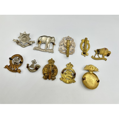 2296 - Ten military cap badges