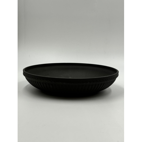 279 - A Wedgwood black basalt circular bowl on pedestal stand - approx. 14cm high x 23cm diameter