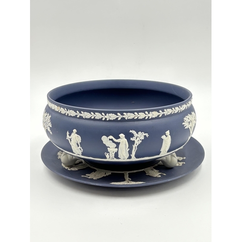 281 - Two pieces of Wedgwood Portland blue Jasperware, one 20cm circular tri-footed bowl and one 24cm circ... 