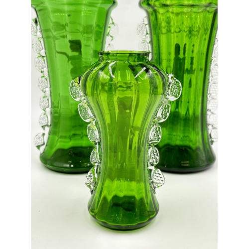 301 - Three Victorian Mary Gregory hand painted green glass vases - largest approx. 28cm high