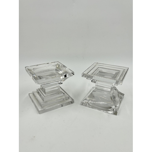 310 - Three pieces of glassware, two Waterford Crystal Metropolitan candleholders - approx. 9cm high and o... 