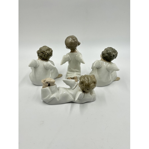 316 - Four Lladro porcelain angel figurines, two 4539 Angel Thinking, one 4541 Angel Laying Down and one 4... 