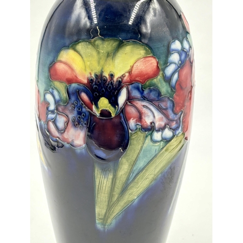 323 - A Moorcroft Orchid pattern lamp base - approx. 26cm high