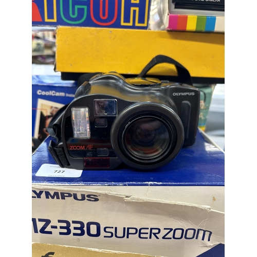 727 - A collection of boxed cameras to include Olympus AZ-330 Superzoom, Ricoh RZ-900 Date, Polaroid The B... 