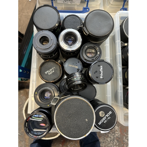 735 - A collection of camera lenses