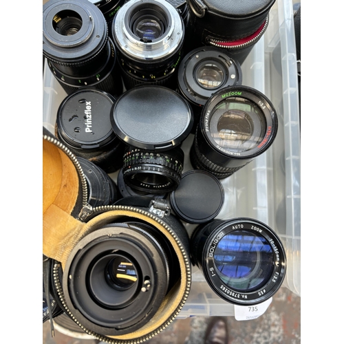 735 - A collection of camera lenses