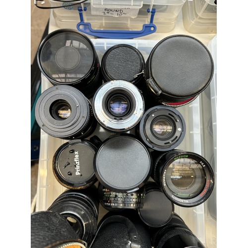 735 - A collection of camera lenses