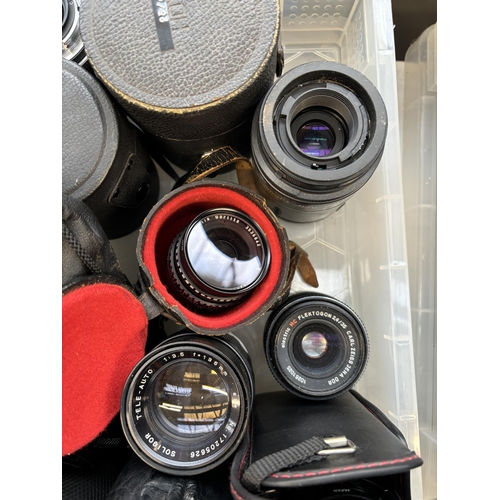 736 - A collection of camera lenses