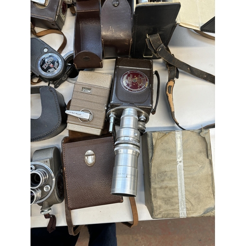 747 - A collection of Bell & Howell cine cameras to include Viceroy, Filmo, Filmo Master etc.