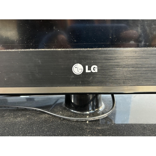 765 - Two LG TVs, one 32CS460 32