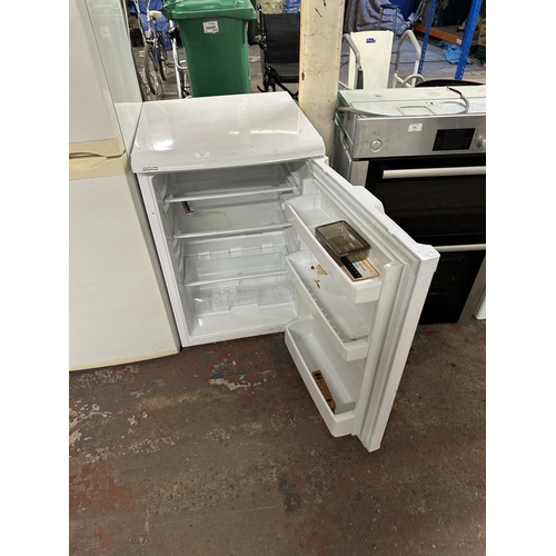 837 - A Beko undercounter fridge - approx. 84cm high x 54.5cm wide