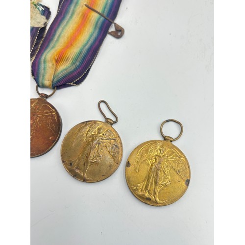 2227 - Four WWI Victory medals, one presented to G-30703 Pte. J.S. Cross The Queen's R., one presented to 1... 