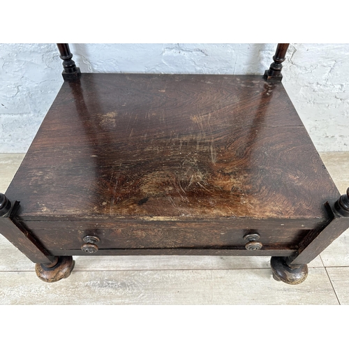 20 - A 19th century rosewood two tier side table/whatnot - approx. 66cm high x 51cm wide x 40cm deep