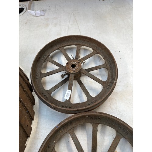 1059B - Four cast iron traction engine wheels to include two Charles Burrell & Sons etc.