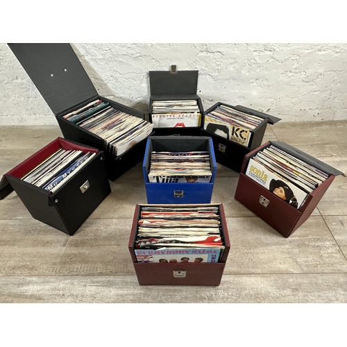 792 - Seven record storage cases containing approx. three hundred and twenty 7