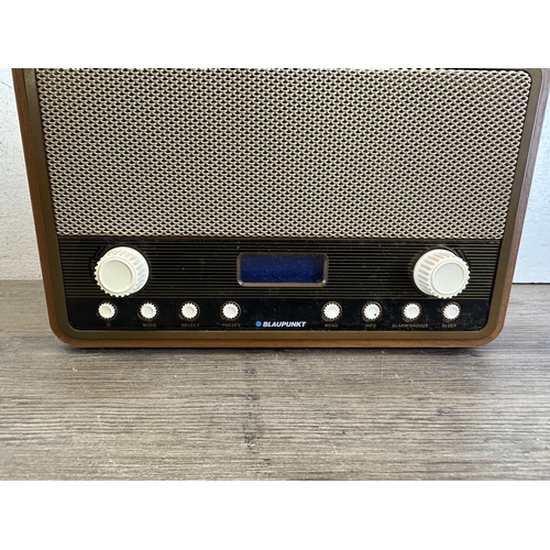 817 - Two radios, one Blaupunkt NE-6212 DAB/FM/alarm clock and one Bush TR82 three-band portable