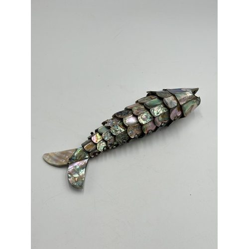 2296 - A vintage abalone shell articulated fish bottle opener - approx. 18cm long