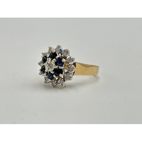 2133A - A hallmarked 9ct gold diamond and sapphire ring, size N - approx. gross weight 4.35g