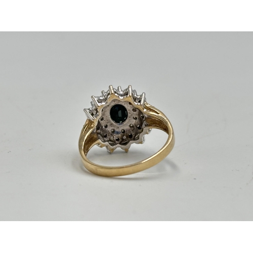 2133B - A hallmarked 9ct gold diamond and sapphire ring, size N½ - approx. gross weight 4.2g