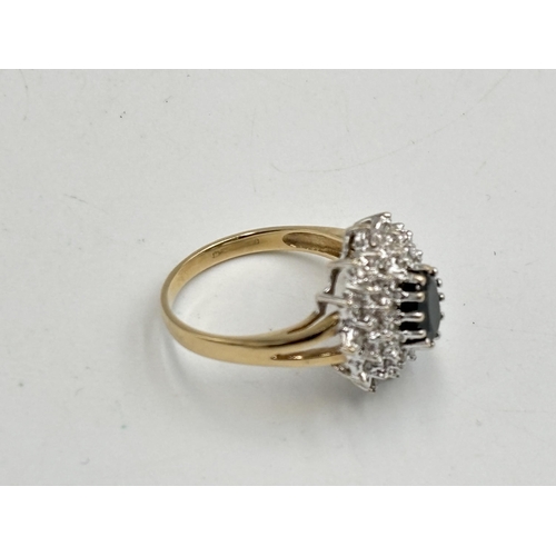 2133B - A hallmarked 9ct gold diamond and sapphire ring, size N½ - approx. gross weight 4.2g