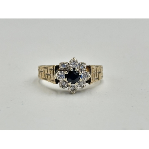 2133C - A hallmarked 9ct gold diamond and sapphire ring, size S½ - approx. gross weight 4.3g